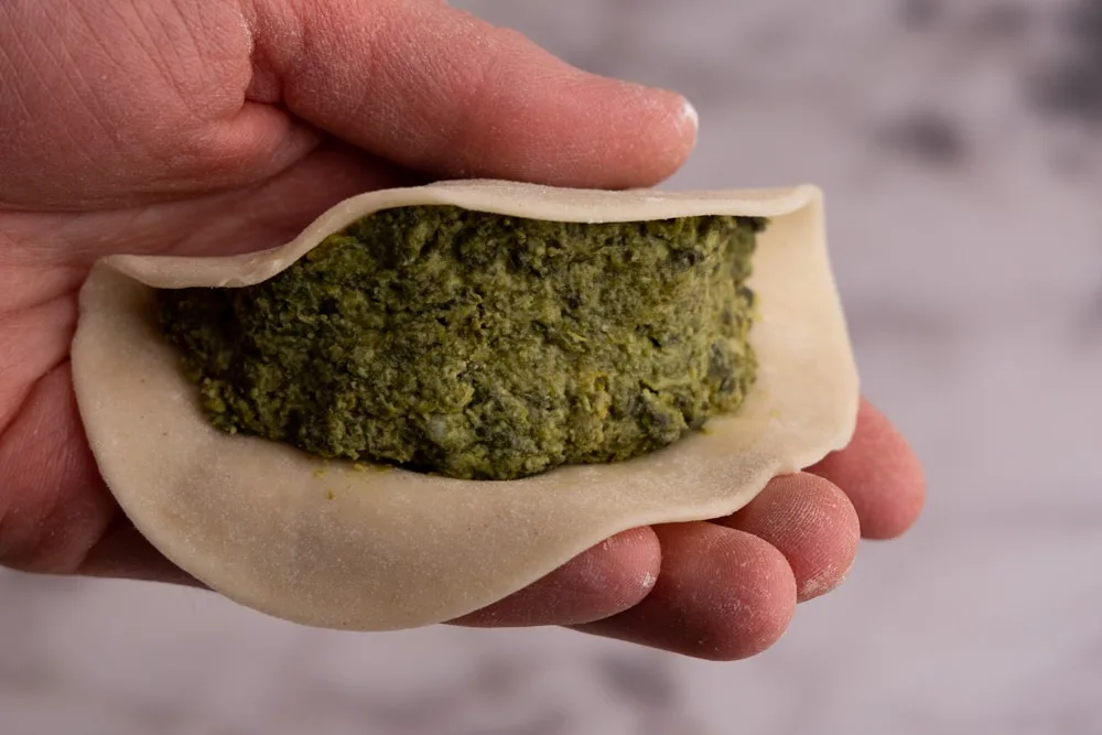 Making a pocket with pierogi dough