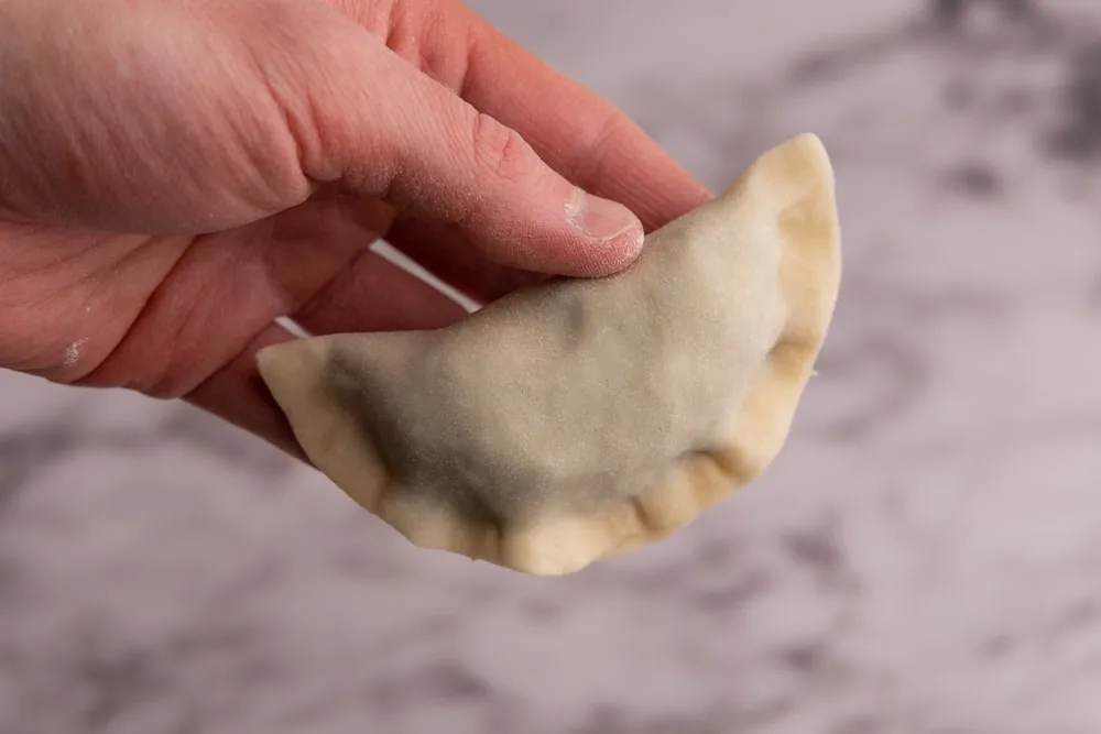 Hand formed spinach pierogi