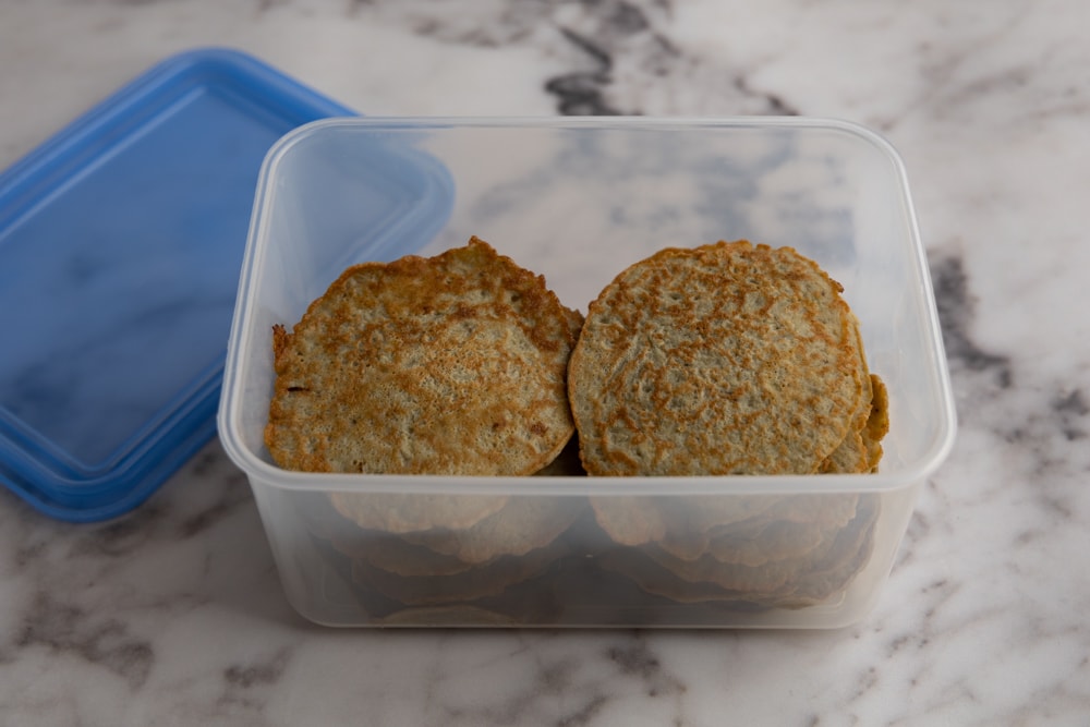 Eggplant pancakes in a storage container