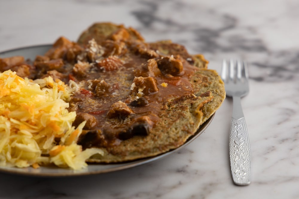 Eggplant pancakes topped with goulash