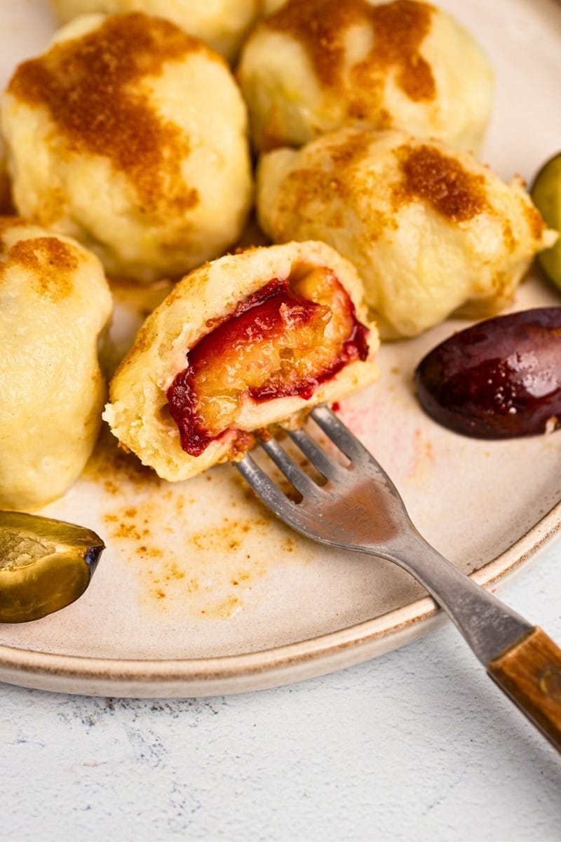 Eating plum dumplings