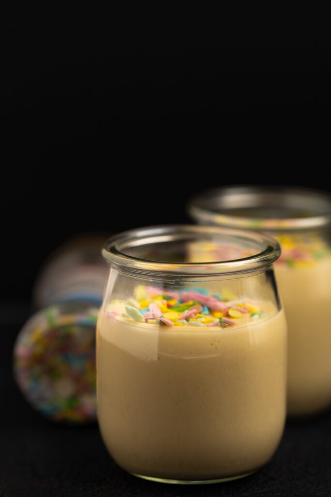 Vanilla pudding with sprinkles served for two