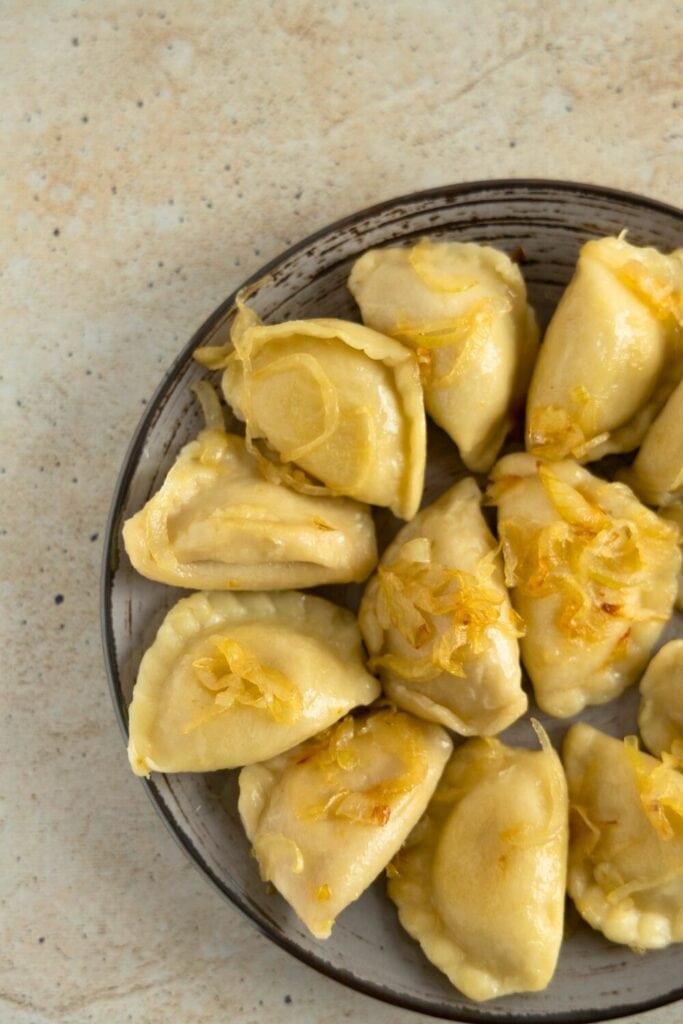 pierogi topped with cooked onions