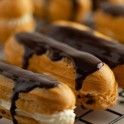 Cream filled eclairs topped with ganache