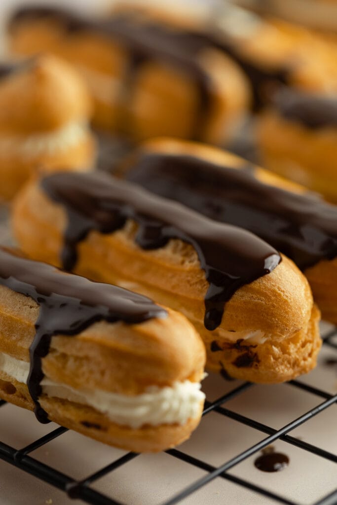 Cream filled eclairs topped with ganache