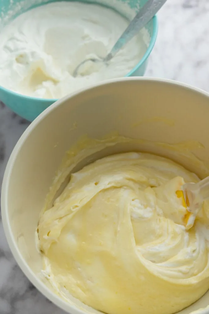 Adding the second portion of whipped cream