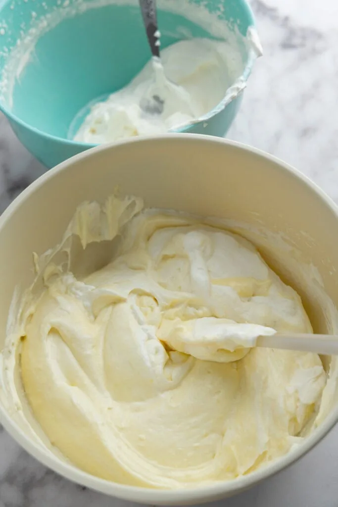 Adding the third portion of whipped cream