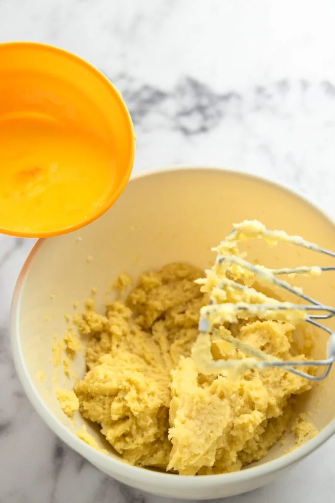 Adding the whisked eggs