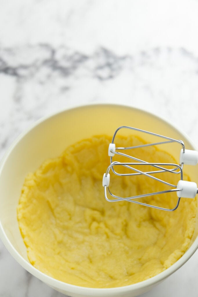 Spread choux pastry in bowl to cool