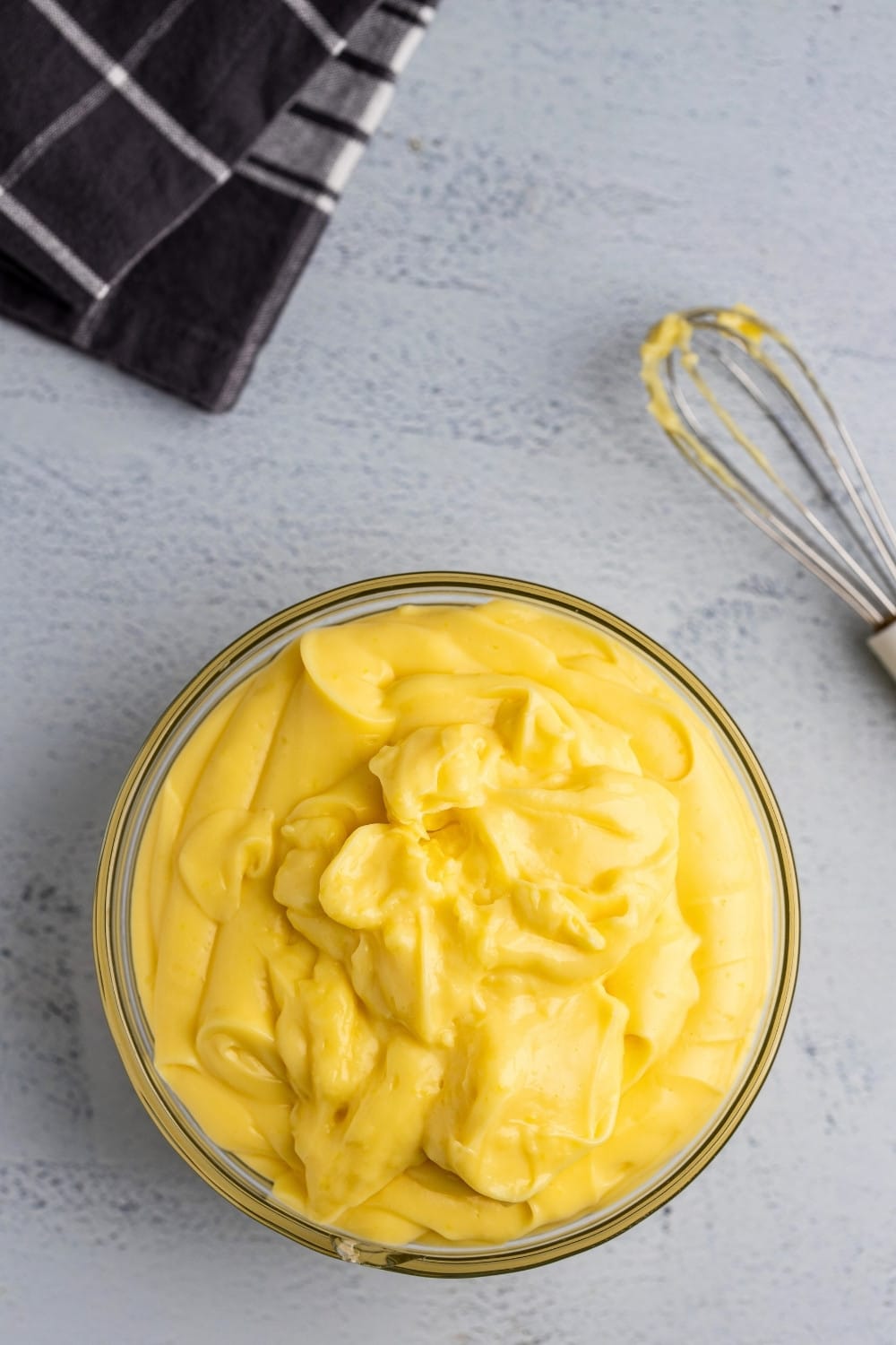 Vanilla pastry cream in glass bowl topdown