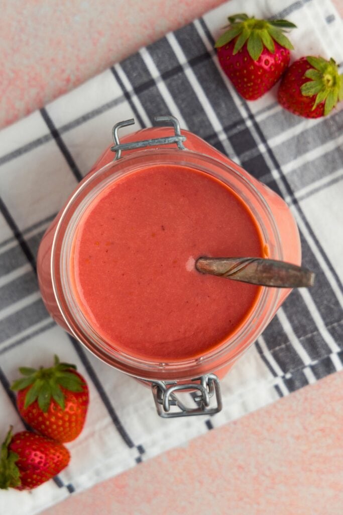 Jar of sweet strawberry curd