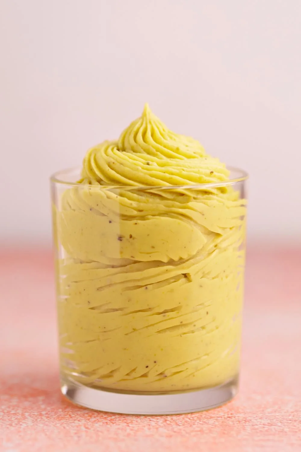 Smooth pistachio pastry cream in a glass