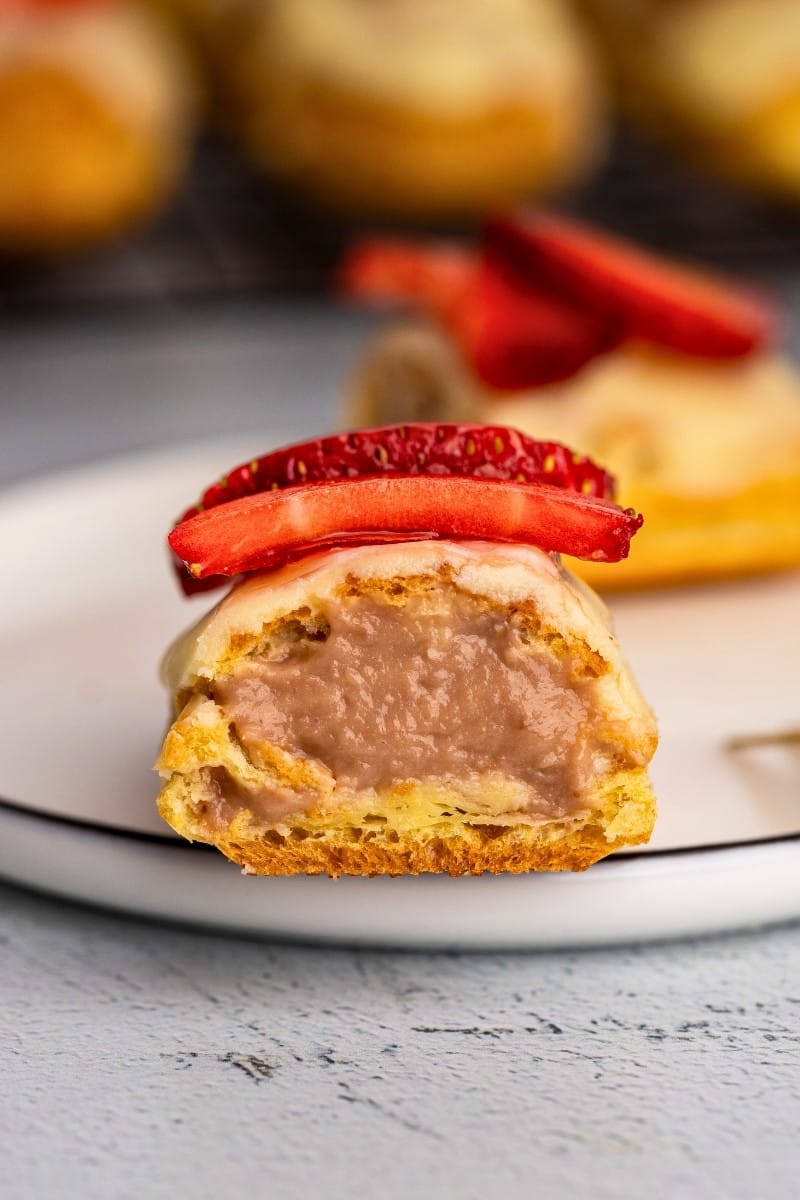 Strawberry pastry cream piped in eclair