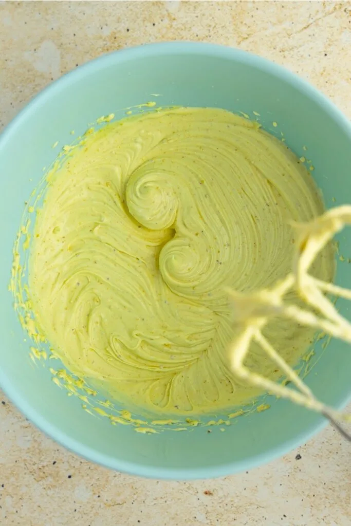 Whisking the pistachio ganache
