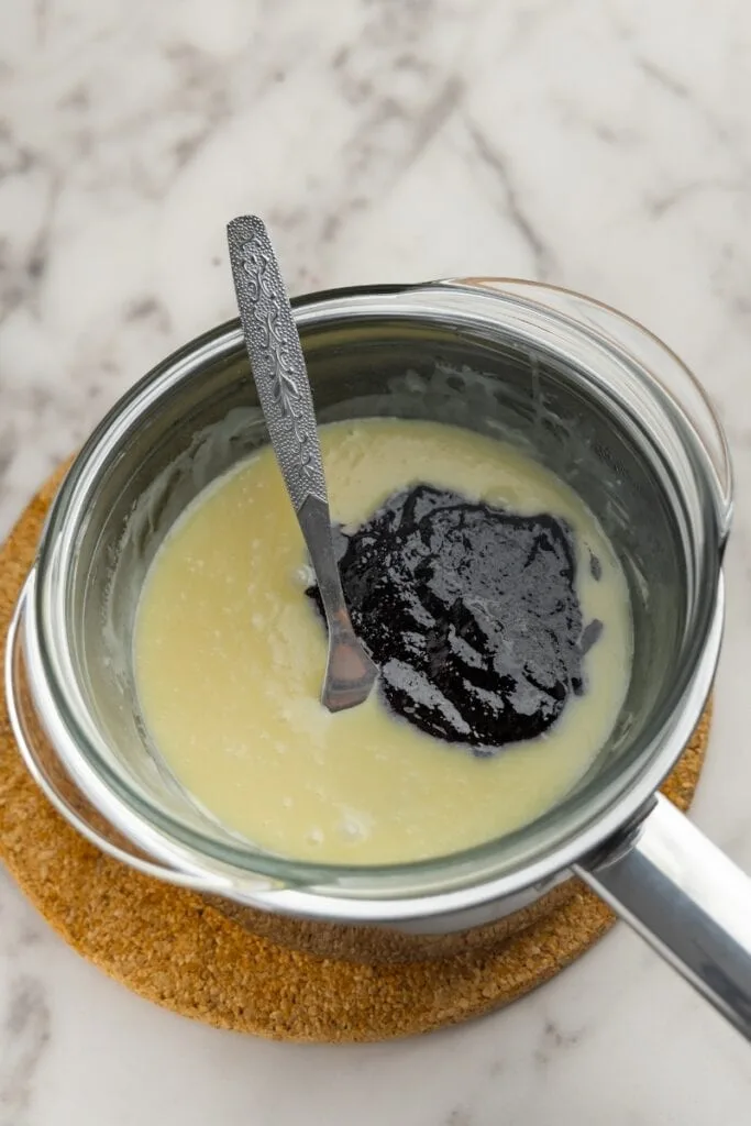 Adding blueberry sauce