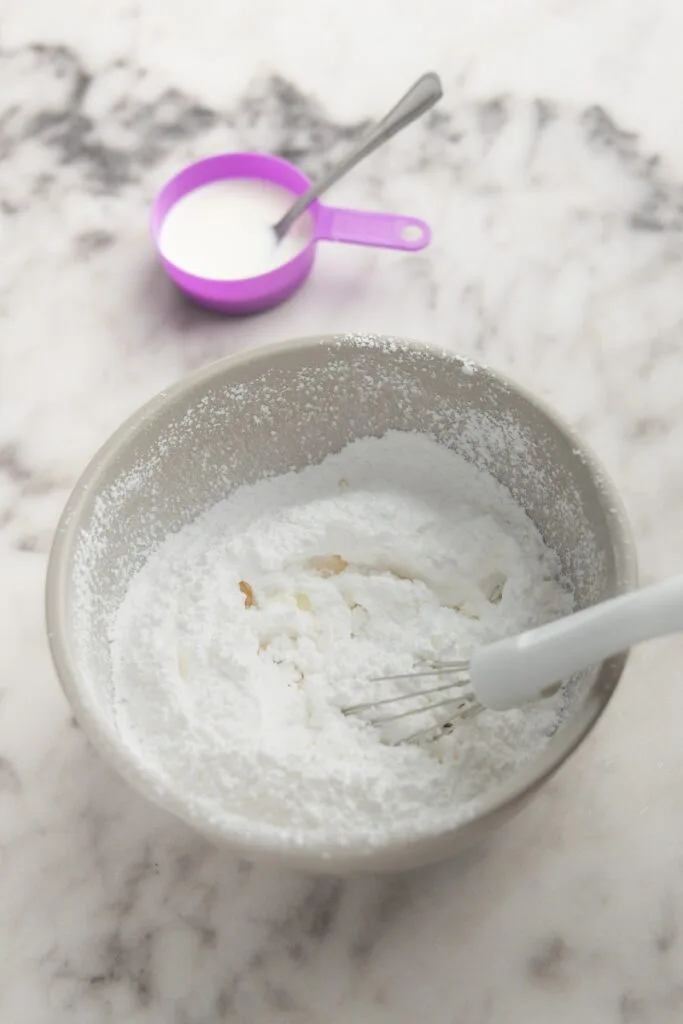 Adding vanilla extract and some milk