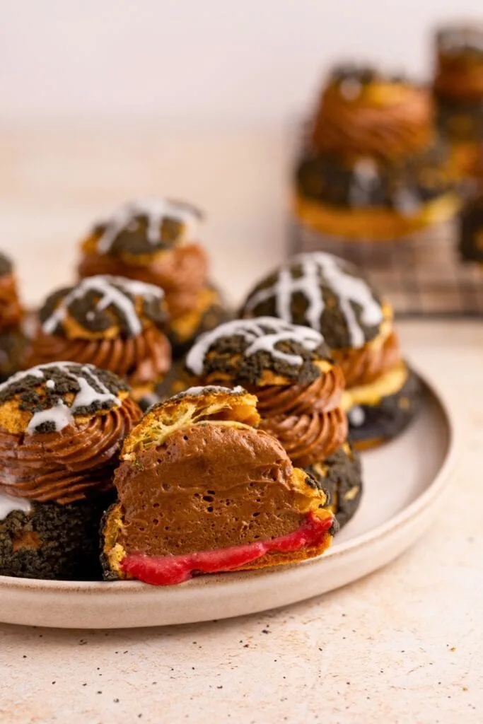 Cream puffs with chocolate diplomat cream and cherry curd