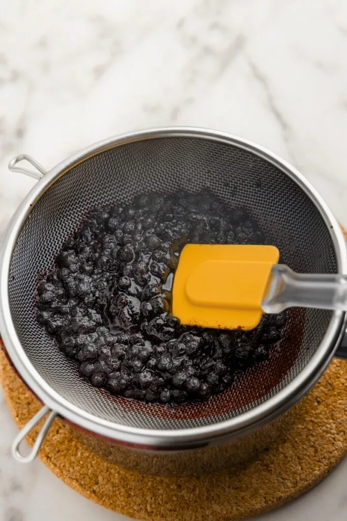 Straining the blueberries