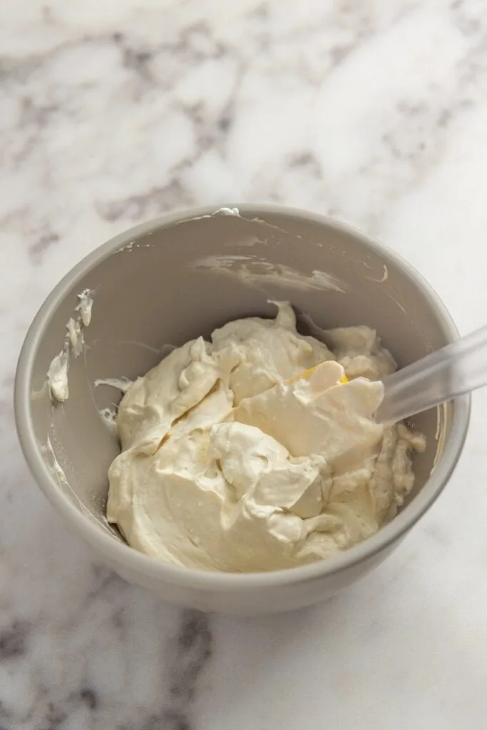 Folding the cream and yolk mixture