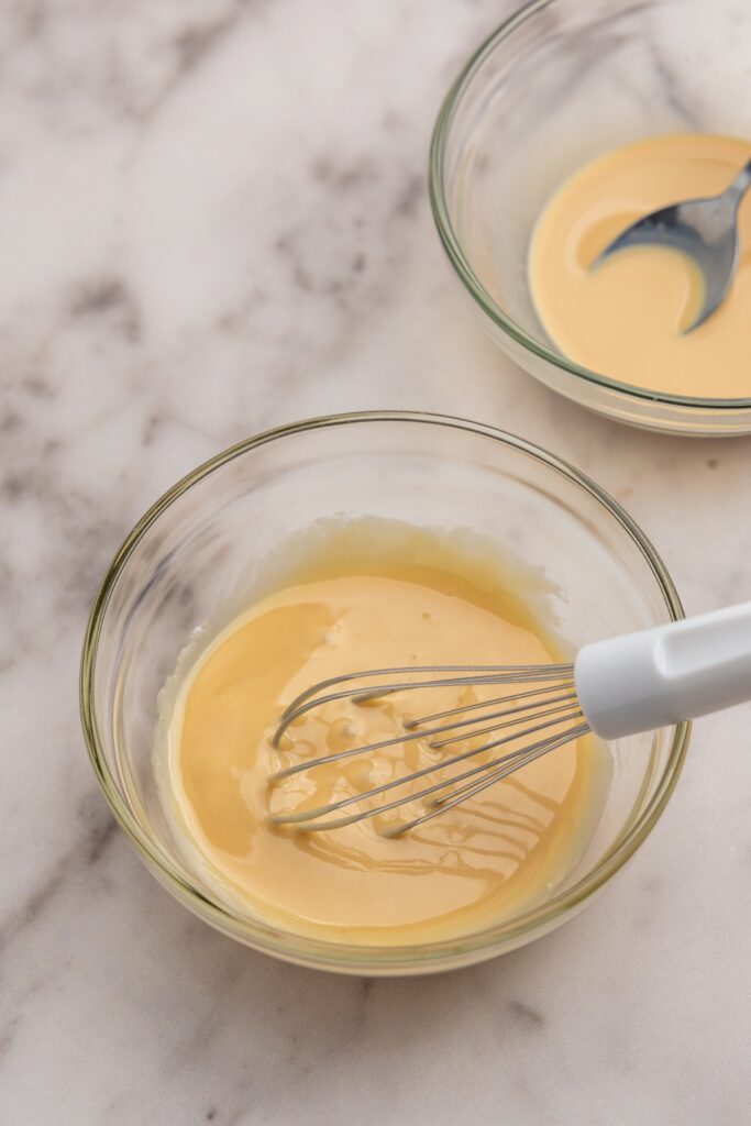 Mixing infused milk with powdered sugar