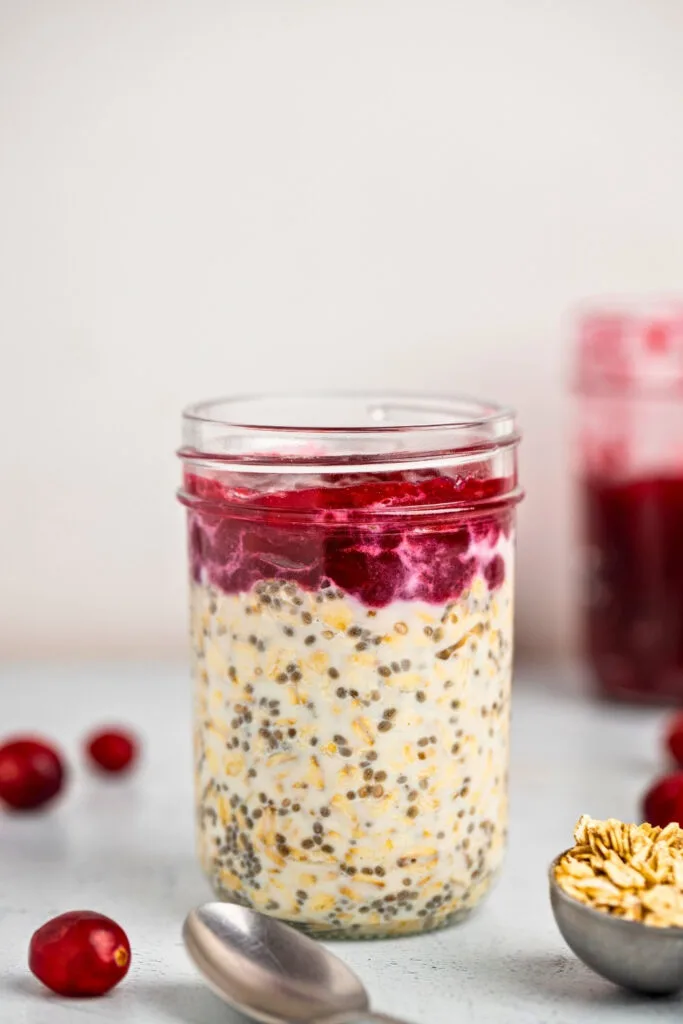 Cranberry overnight oats in a glass jar