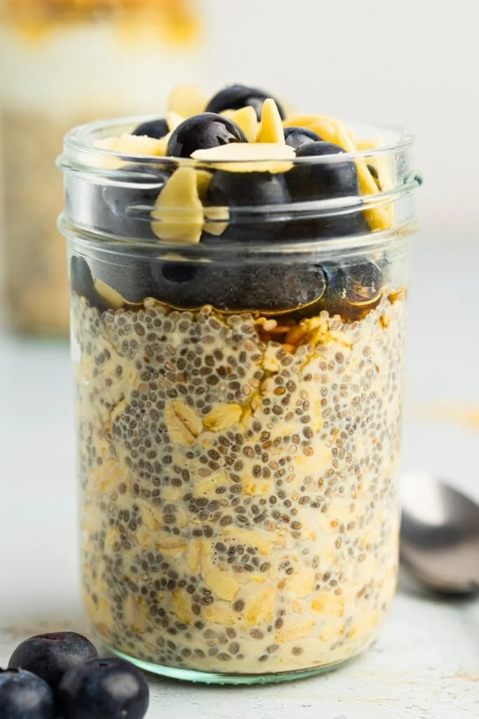 Overnight oats layered with blueberries and sliced almonds