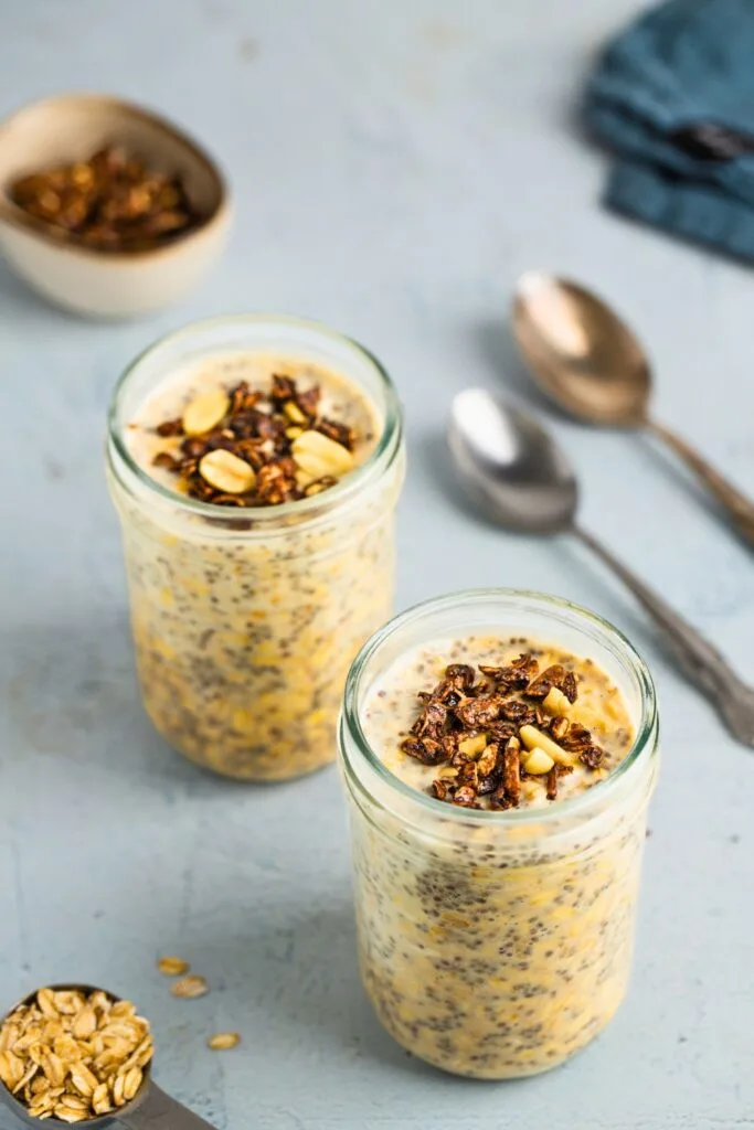 Protein powder oats for two topped with granola and nuts