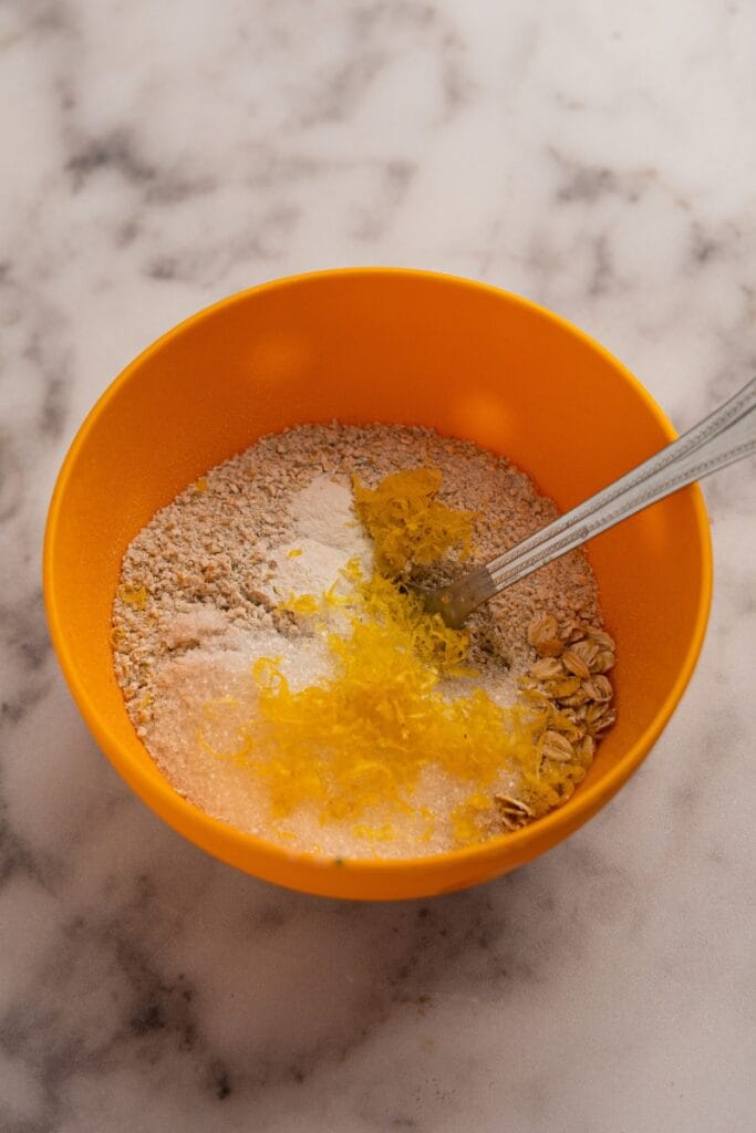 Adding lemon zest and sugar