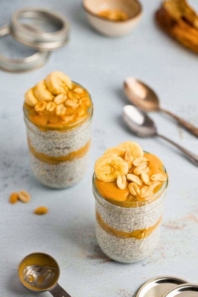 Thick and luscious peanut butter banana chia pudding in breakfast jars