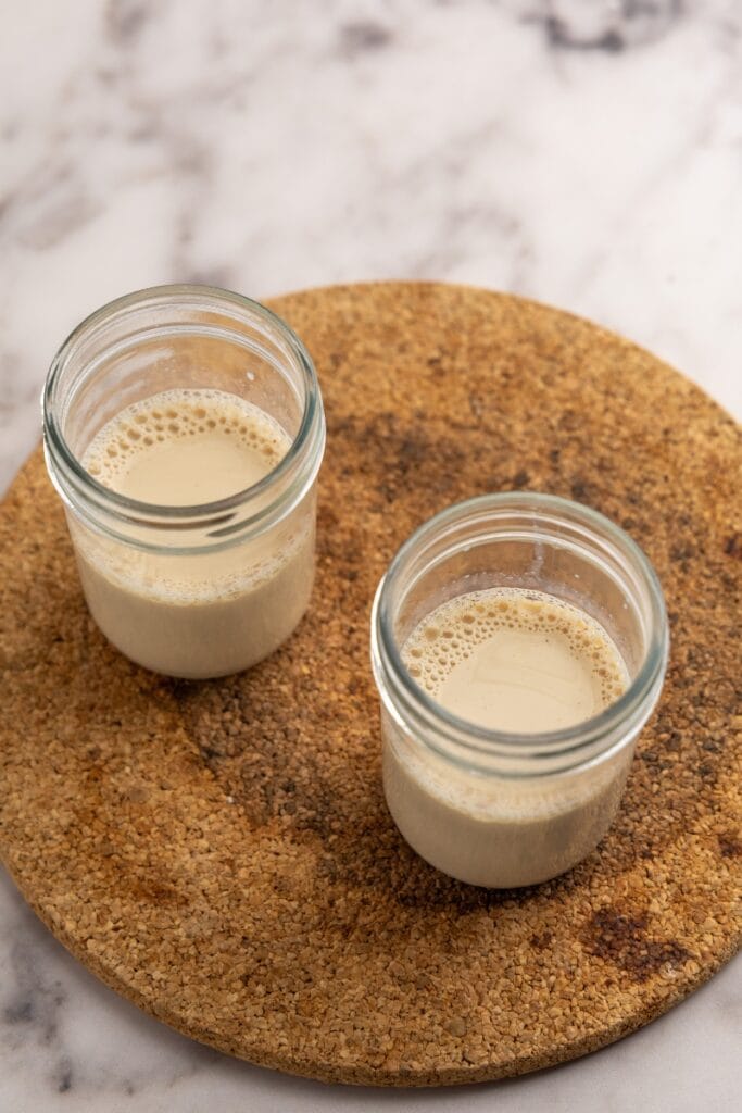 Chai milk mixture in two jars