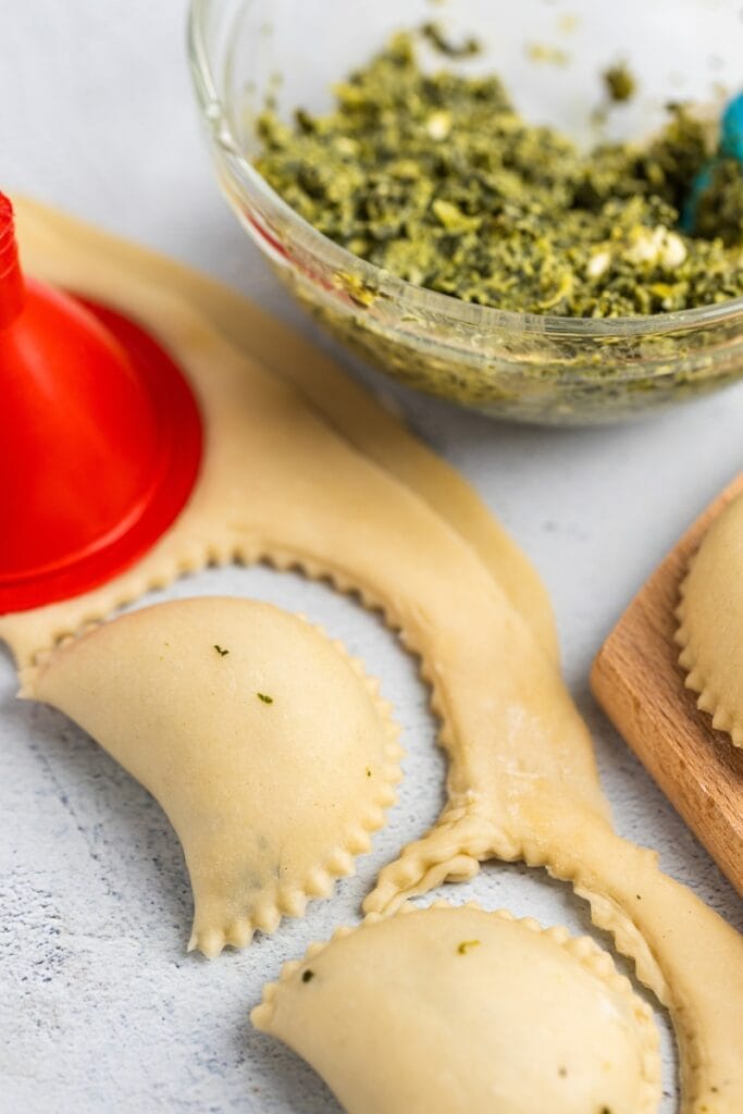 Spinach pierogi sealed and ready to cook