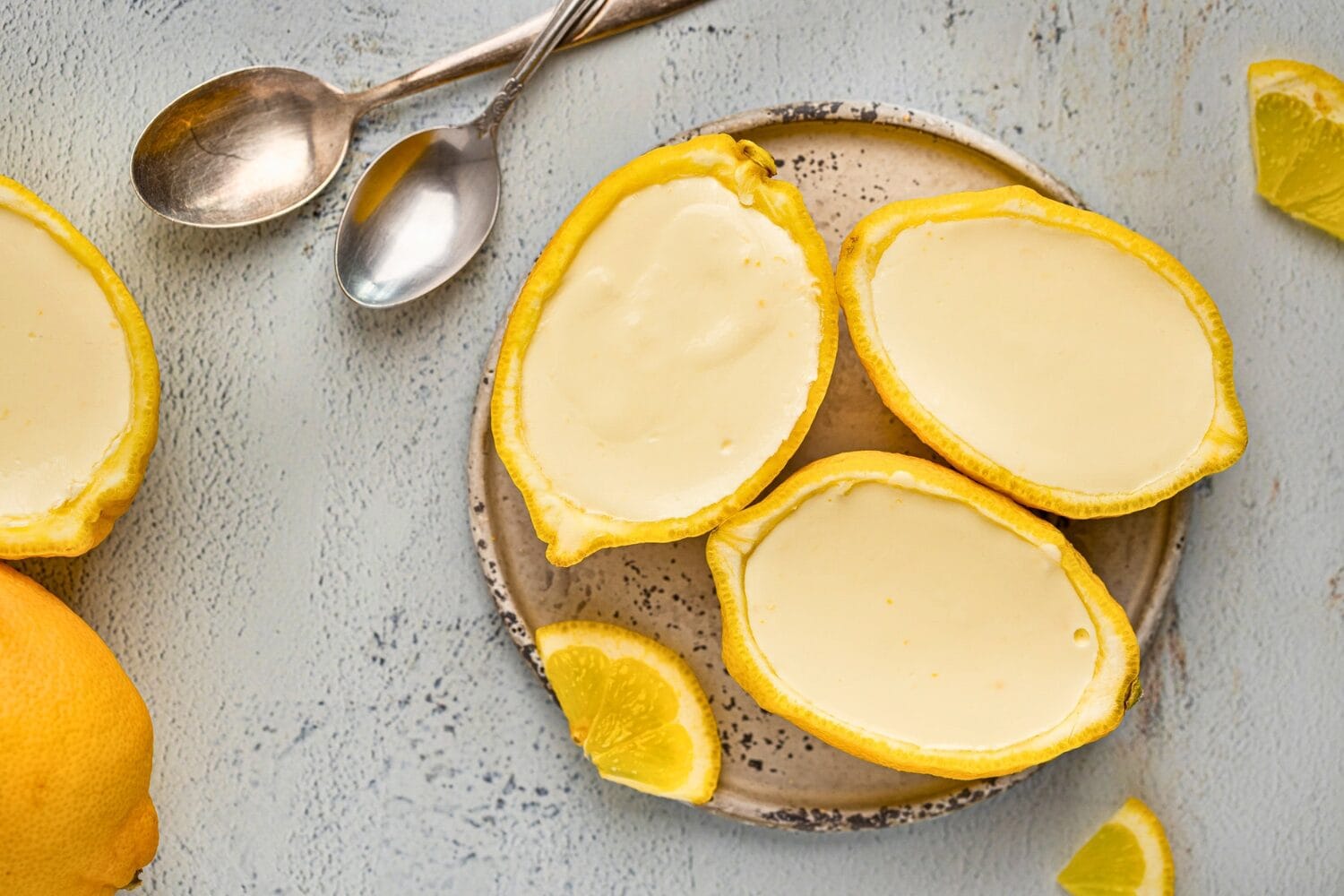 Creamy lemon posset in hollowed lemons