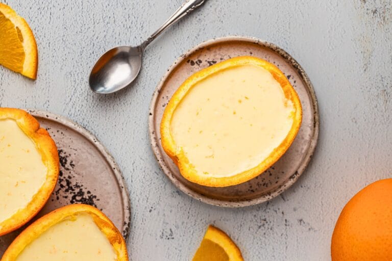 Creamy orange posset in fresh orange shell