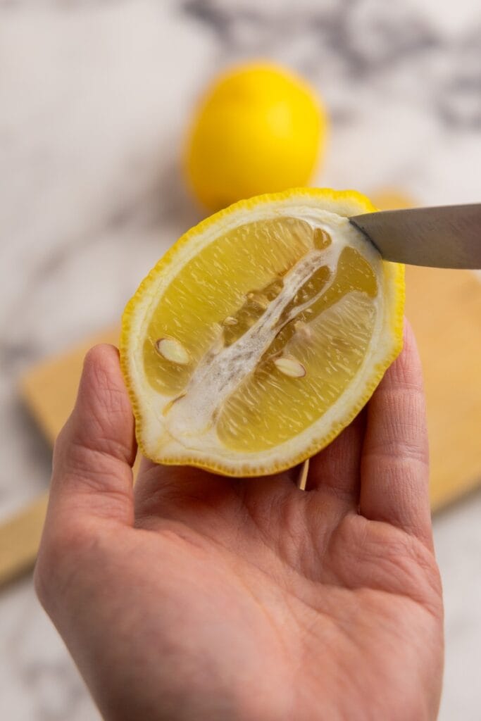 Removing the lemon flesh