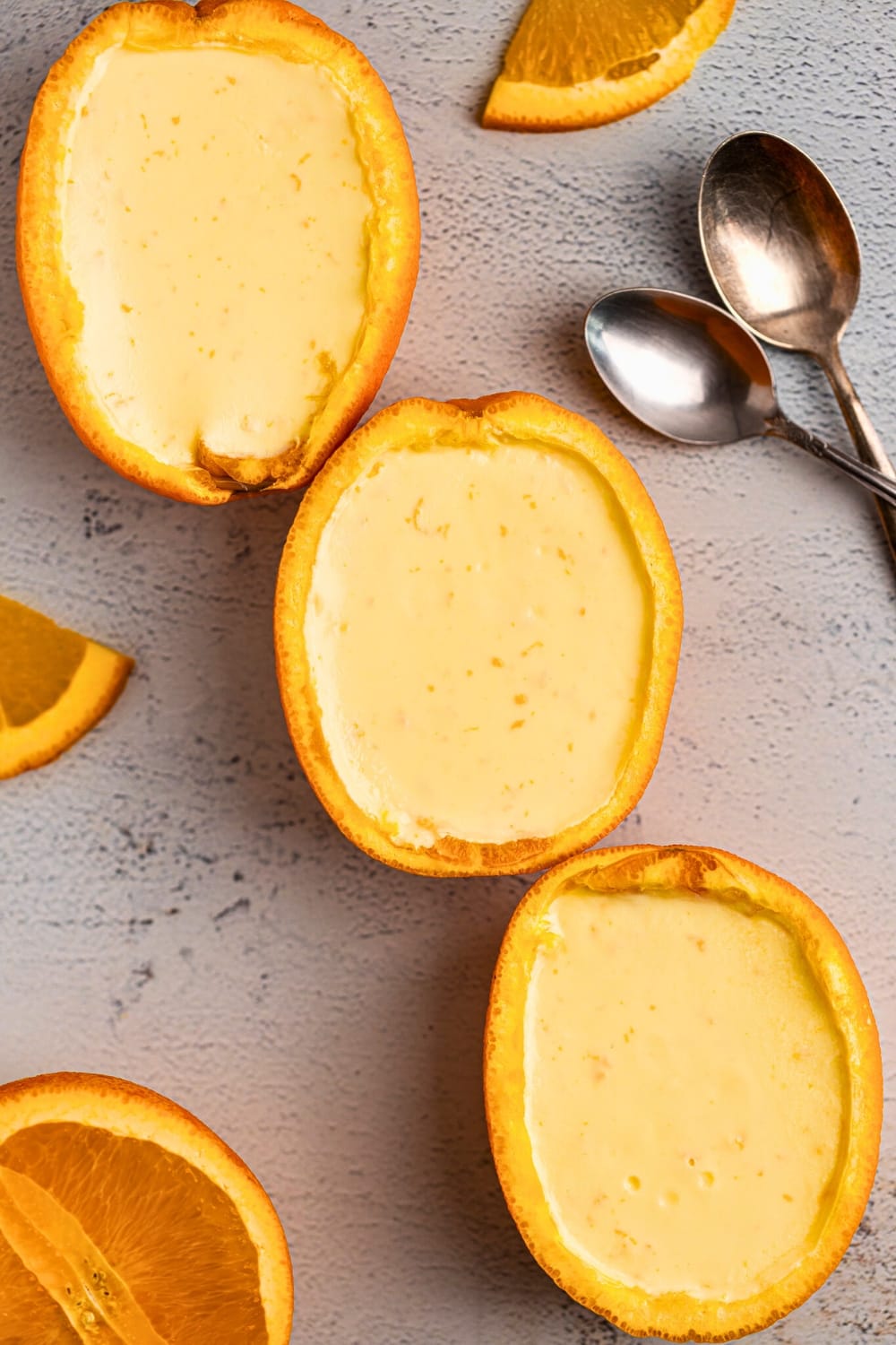 Smooth and silky orange posset in hollowed oranges