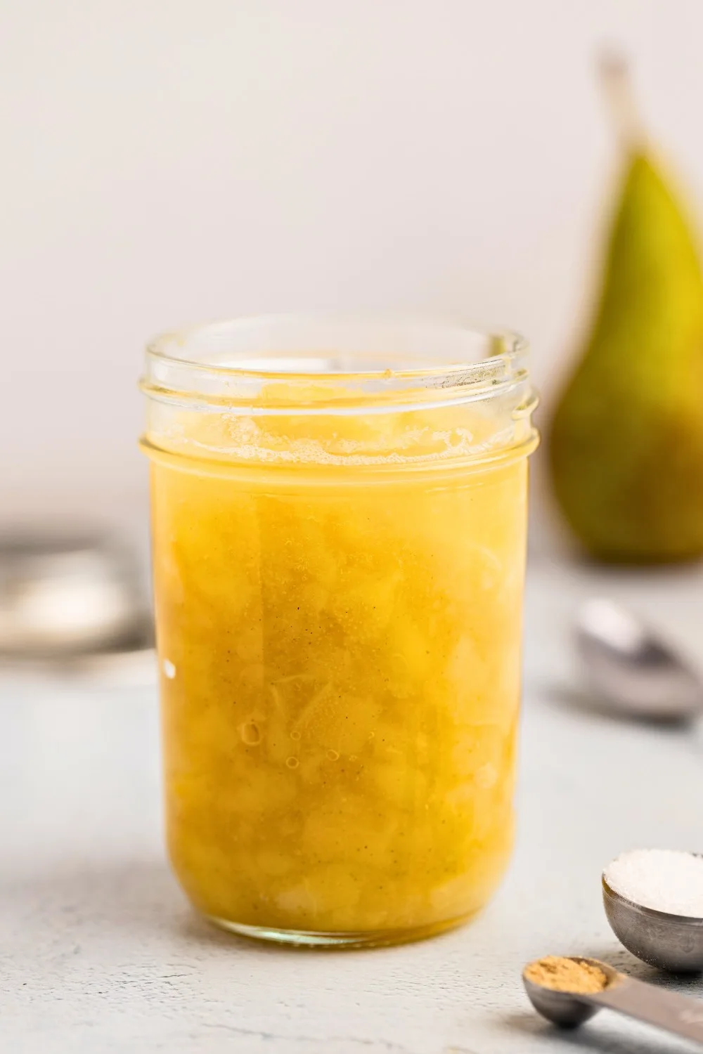 Pear compote in a glass jar