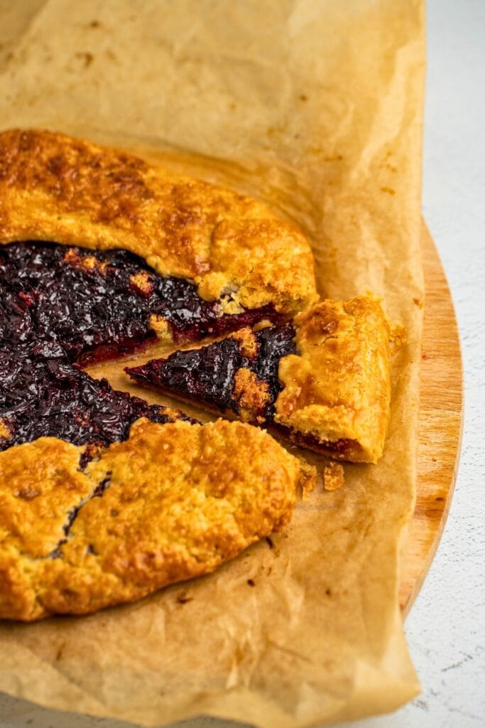 Cherry frangipane galette just cut slice