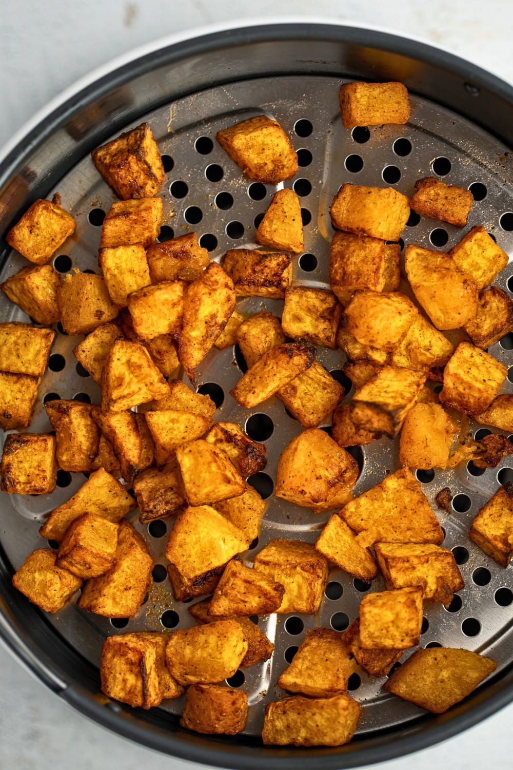 Air fryer butternut squash in basket