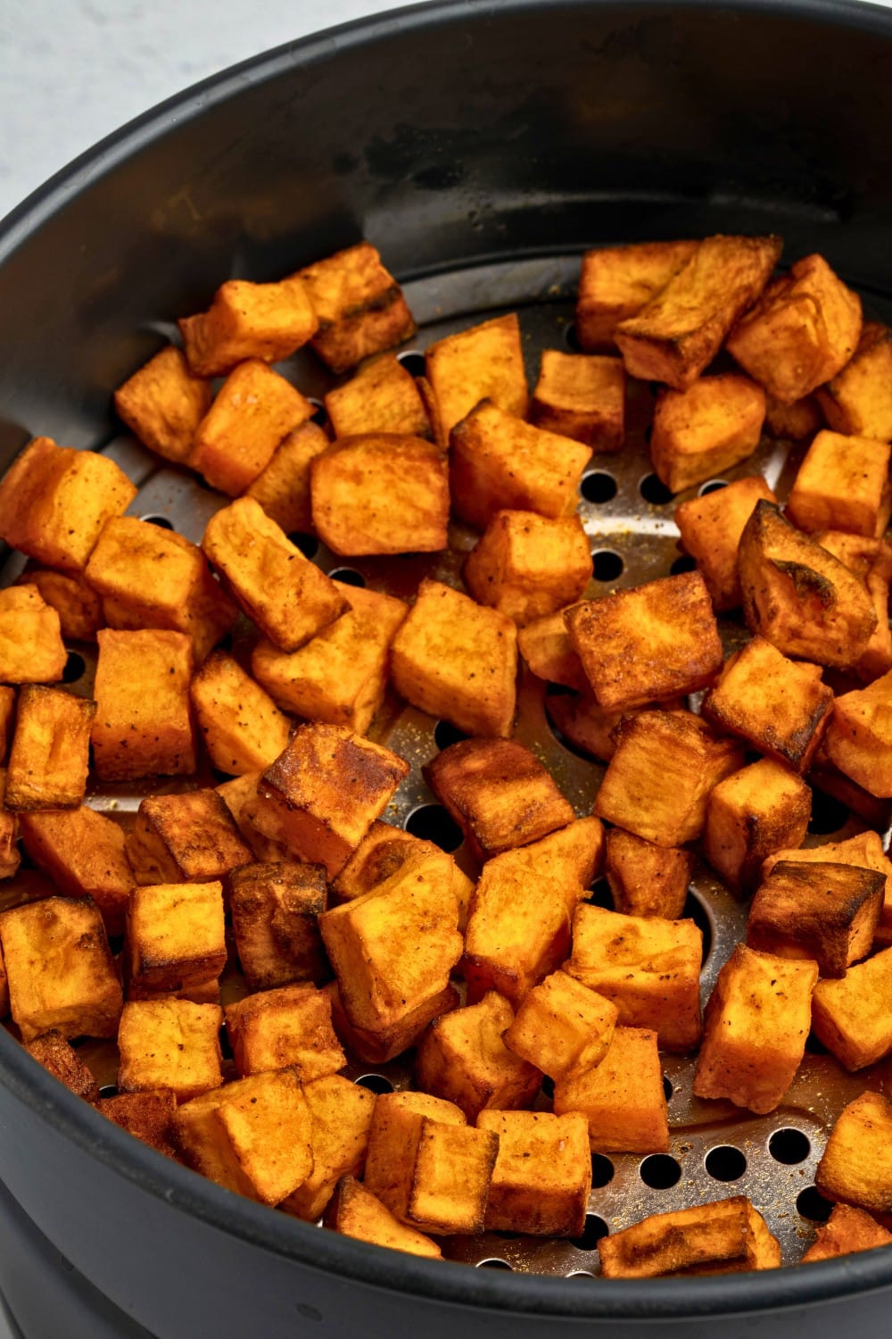 Air fryer sweet potato in basket