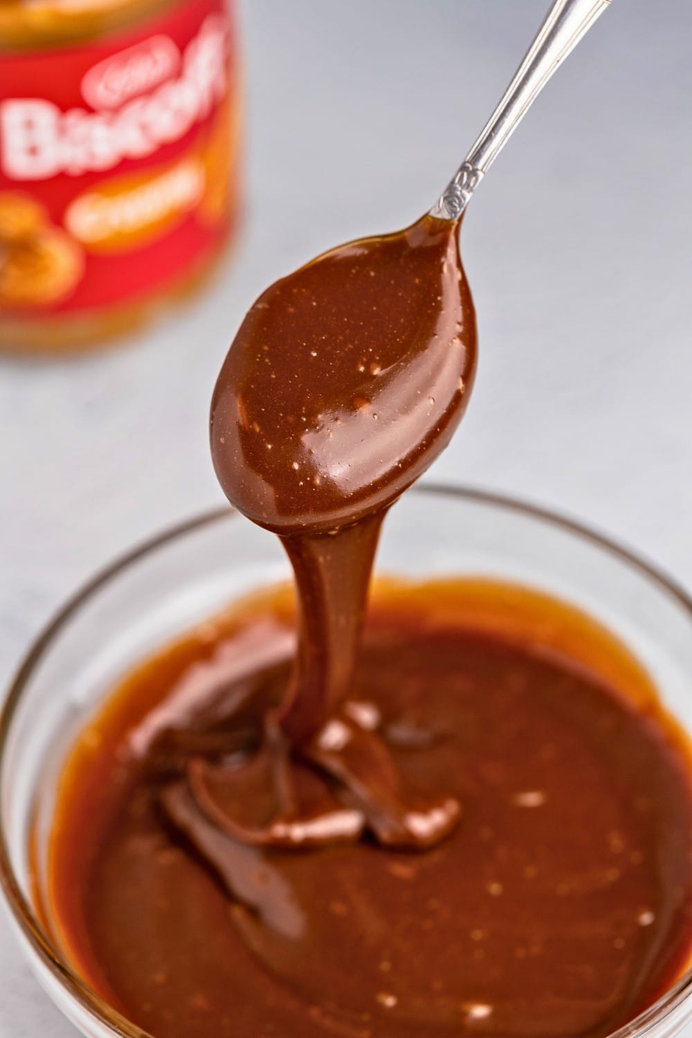 Biscoff milk chocolate ganache: pouring shot