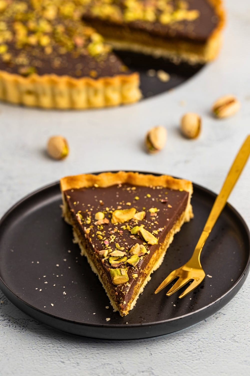 Dubai chocolate tart slice plated