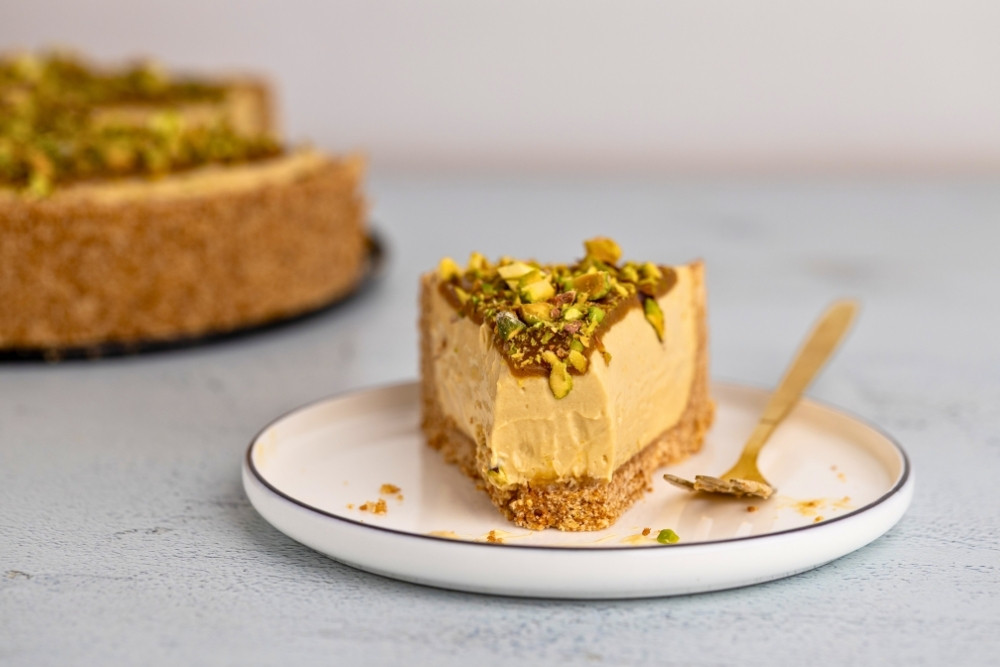 No bake pistachio cheesecake cut into