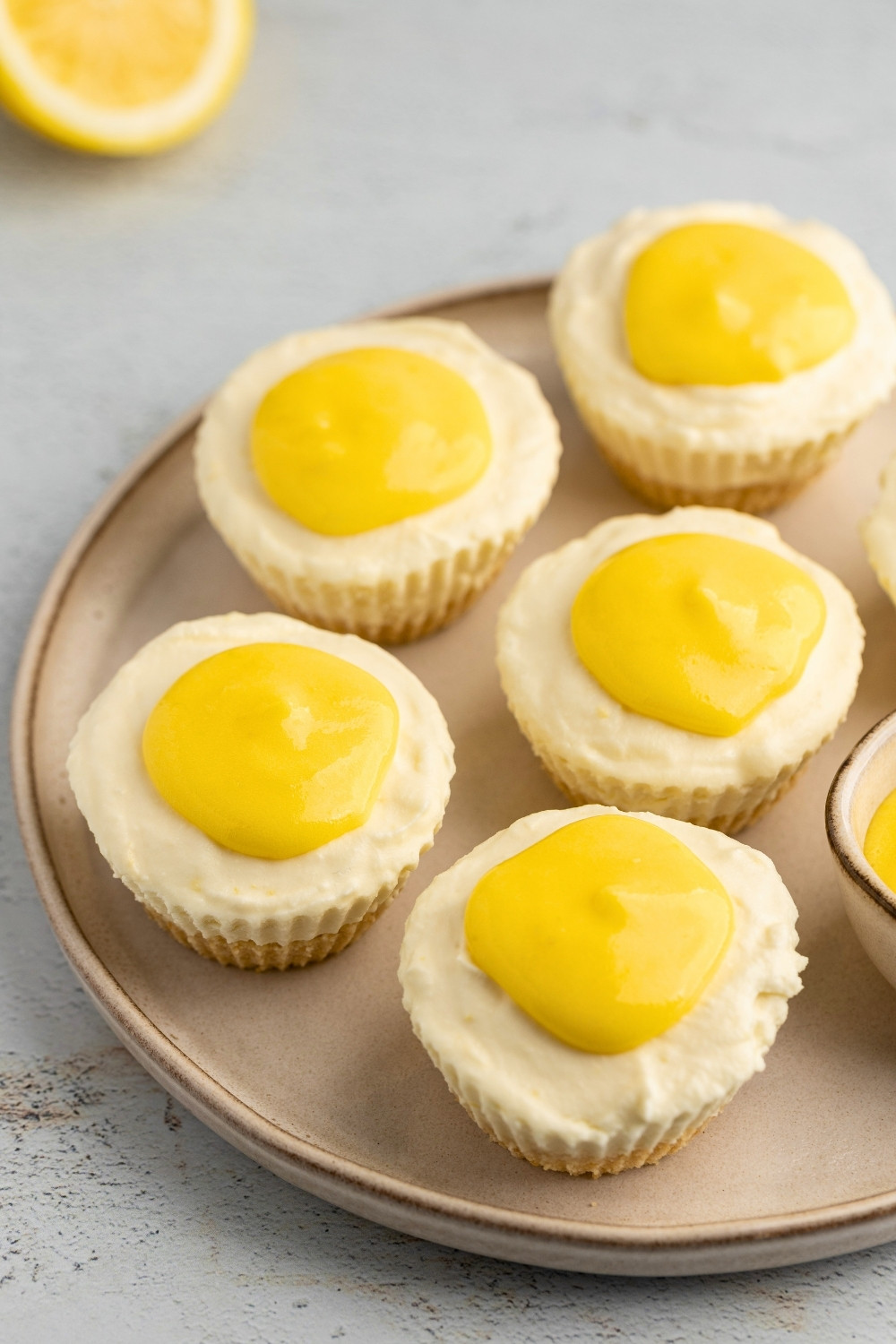 Mini lemon cheesecakes plated