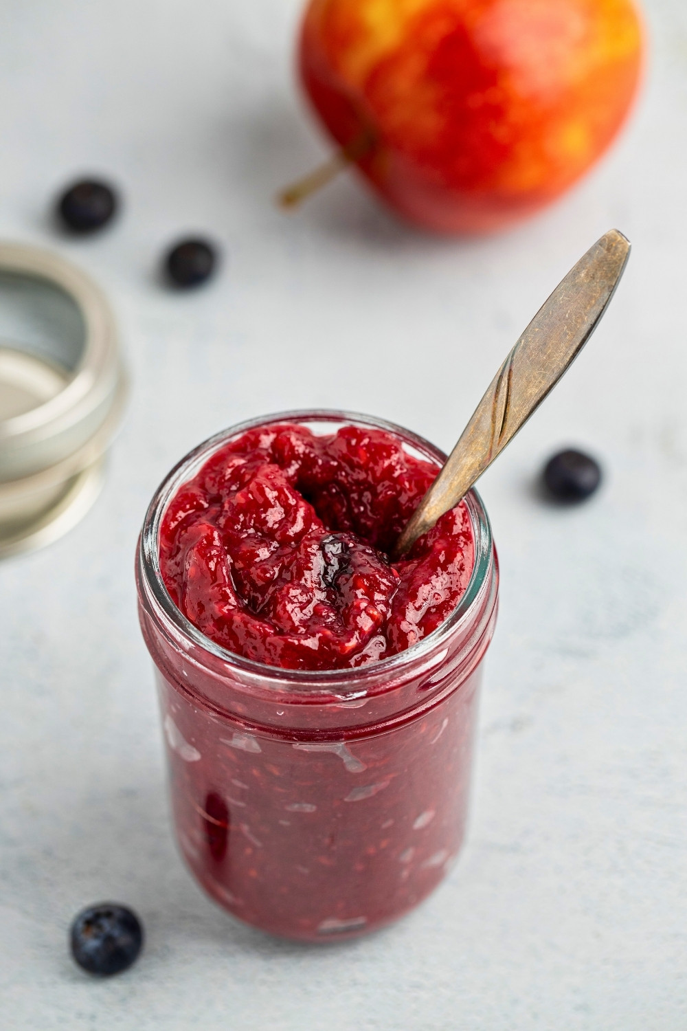 Apple mixed berries compote in a jar
