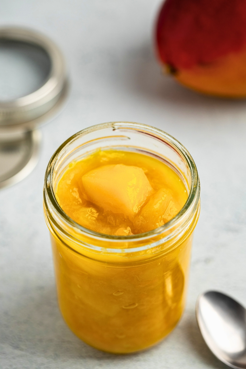 Mango compote in glass jar