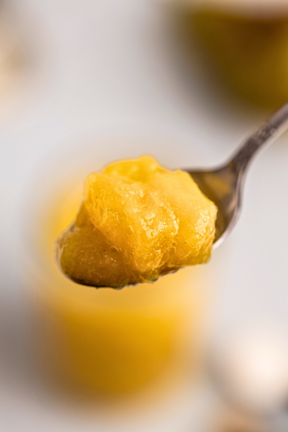Pear compote on teaspoon