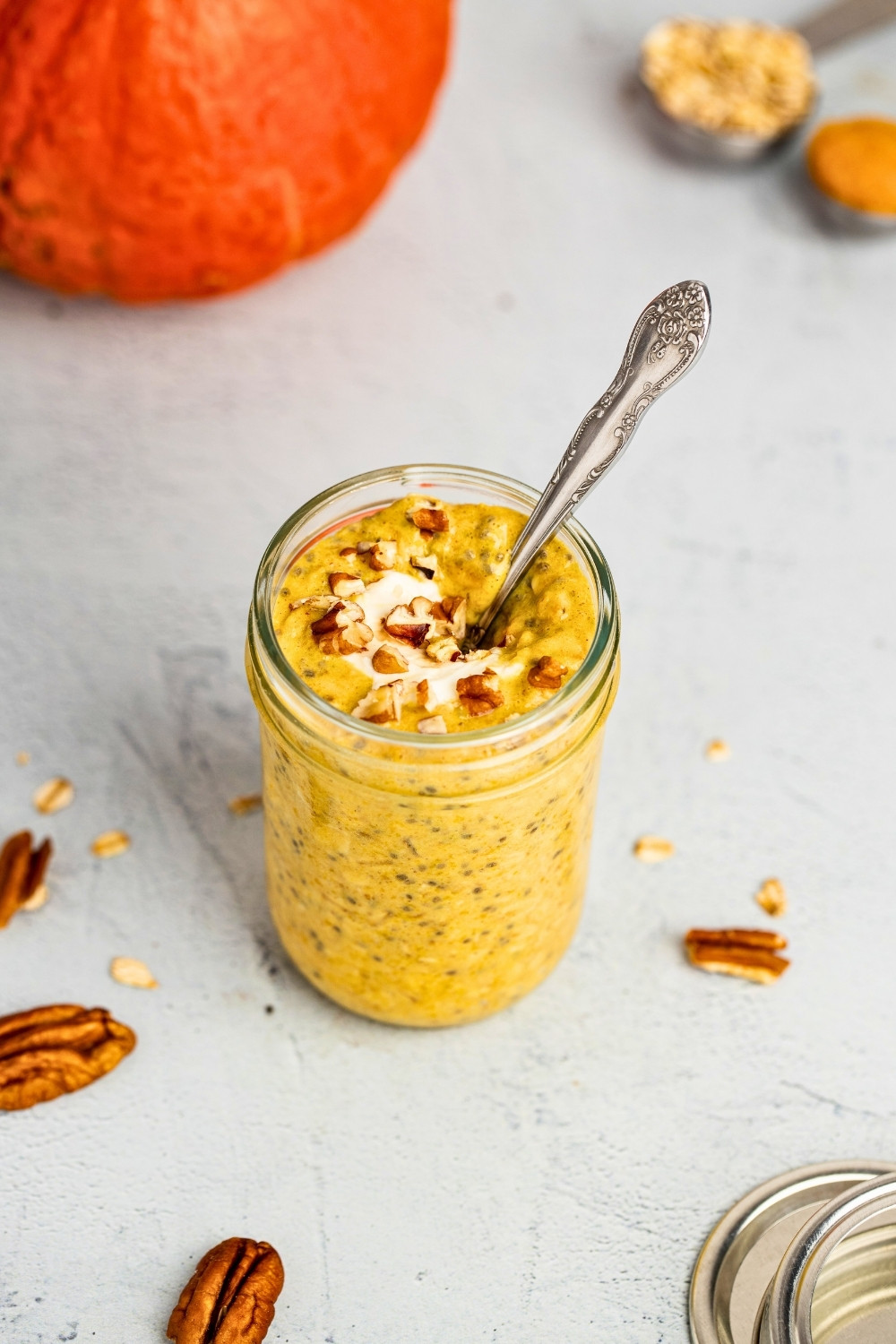 Pumpkin overnight oats jar with spoon